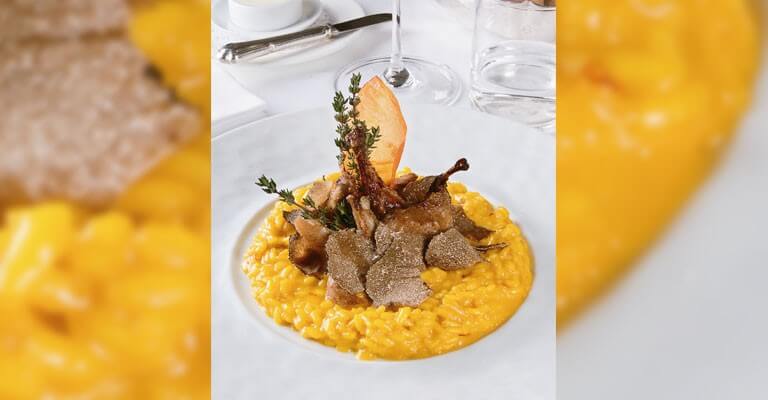Risotto au safran, poitrines de caille et truffe blanche par le Chef Antonio Gavazzi